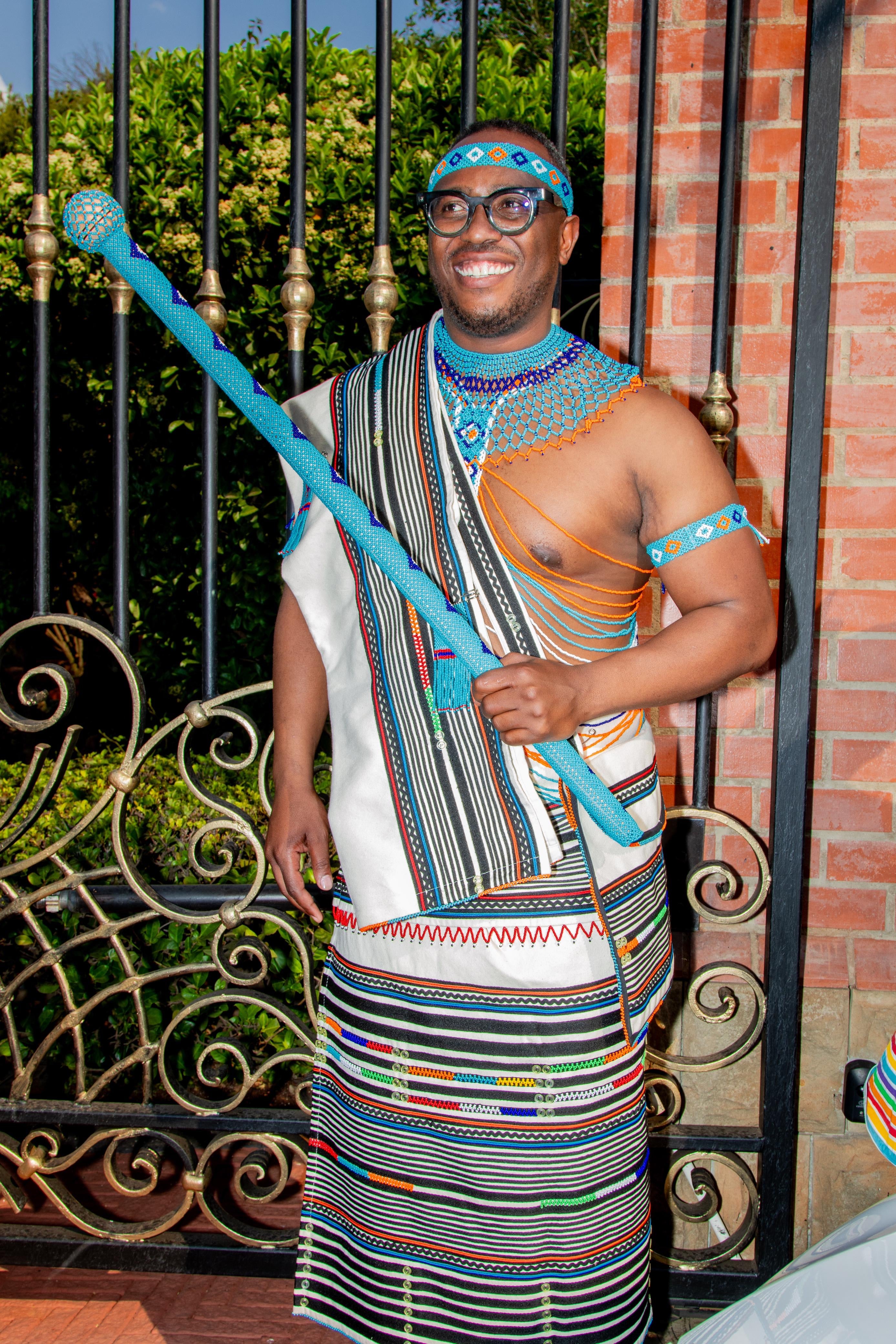 Cream heavily beaded groom set