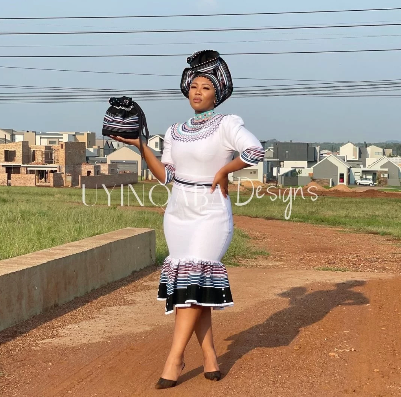 Zimkhita Peplum Dress