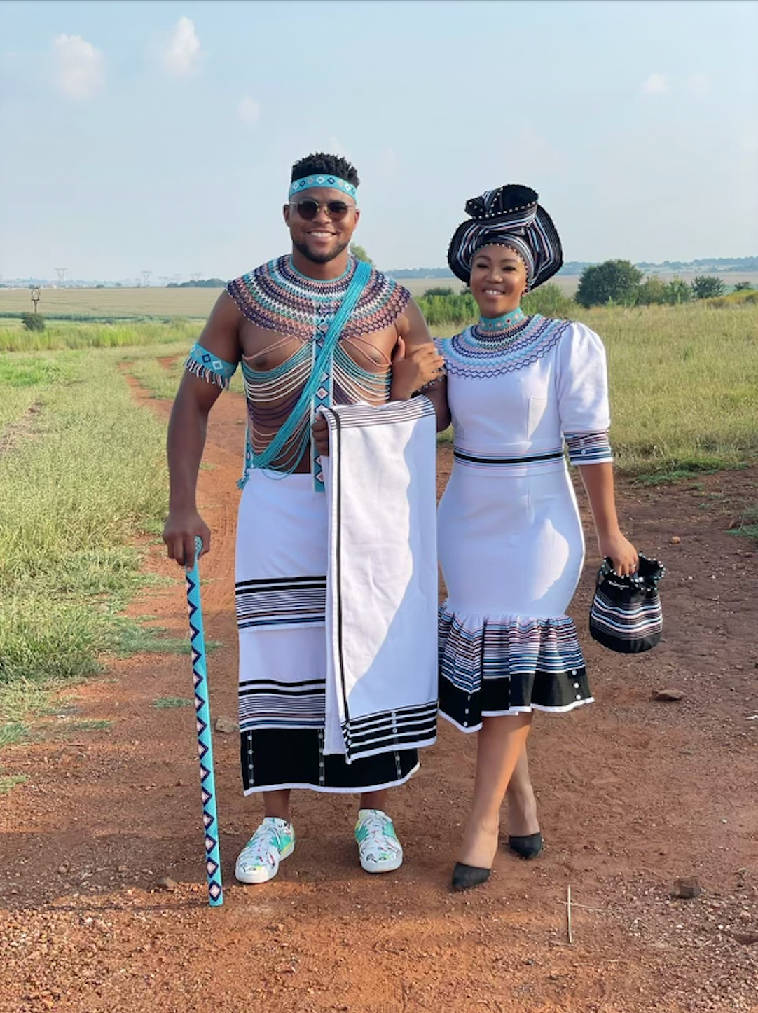 White, black, pink and blue his and hers ensemble