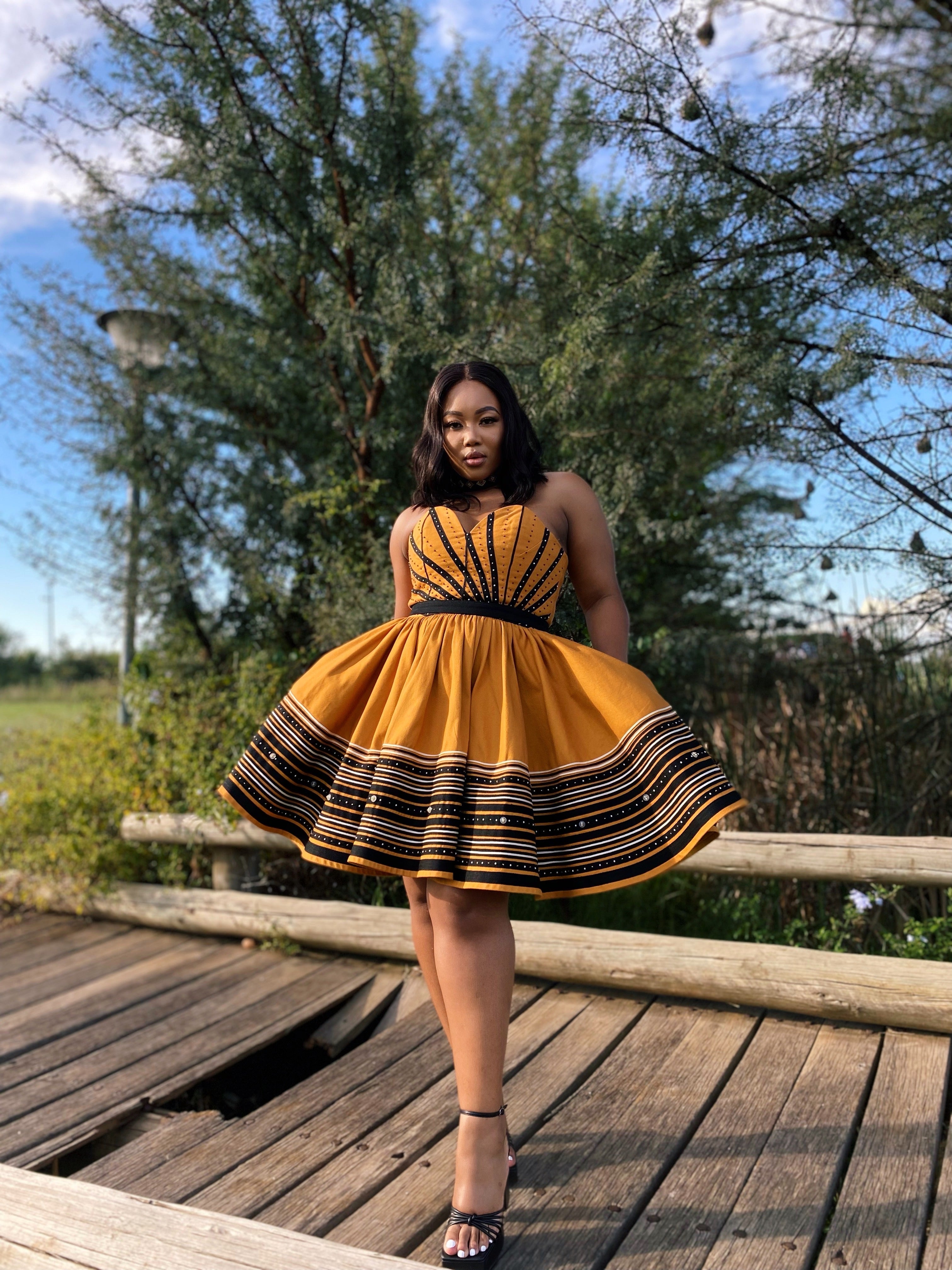Qaqamba Mustard full flare dress