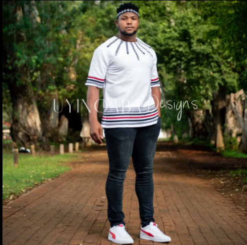 White, black and red short sleeve shirt