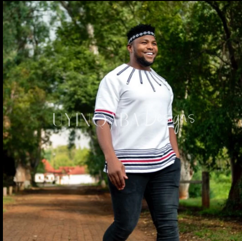 White, black and red short sleeve shirt